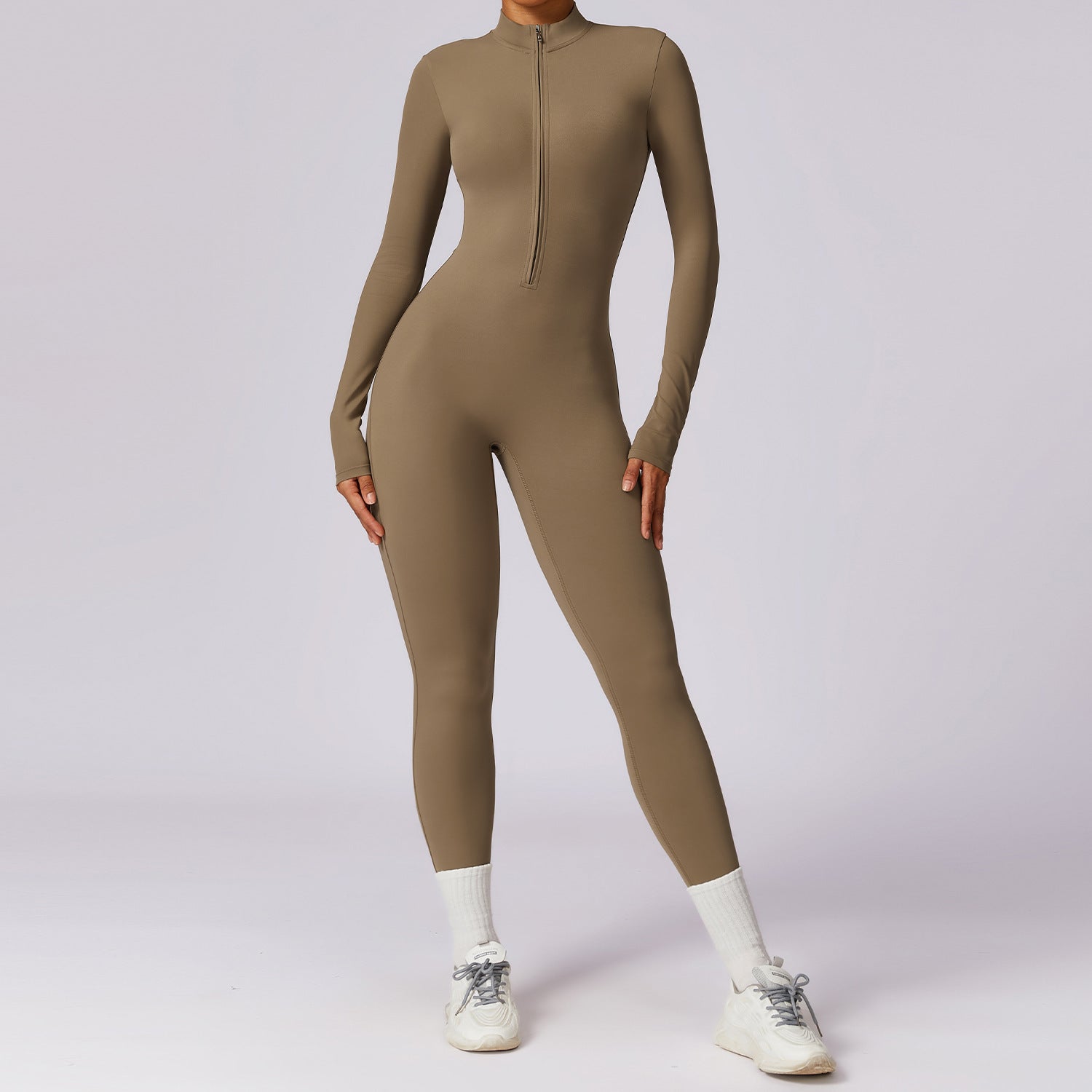 Tuta sportiva da donna a maniche lunghe con cerniera
