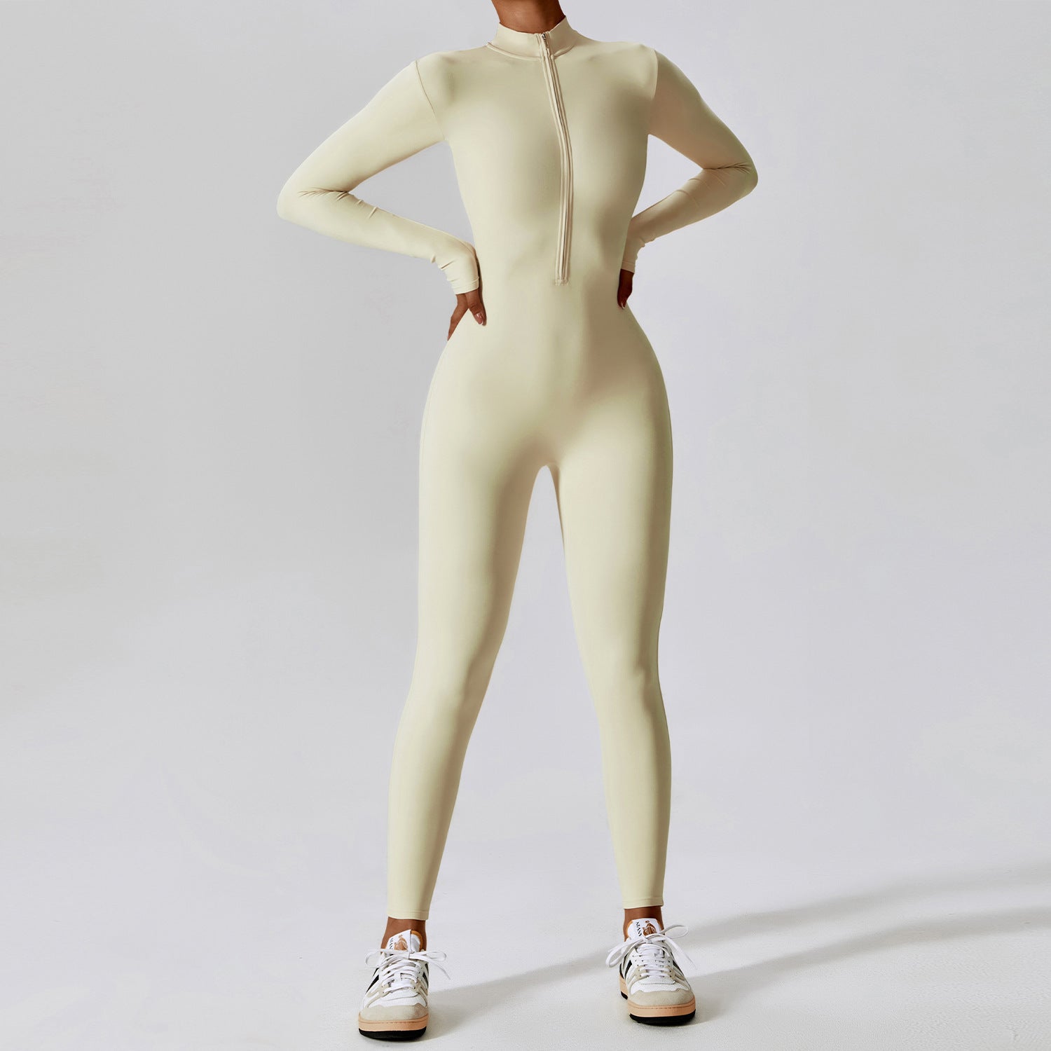 Tuta sportiva da donna a maniche lunghe con cerniera