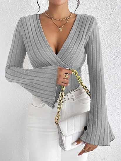 T-shirt girocollo a maniche lunghe da donna in maglia a coste autunnale e invernale, con scollo a V e maniche a campana, elegante top da donna